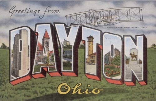 A vintage postcard that says Greetings from Dayton with images of local landmarks